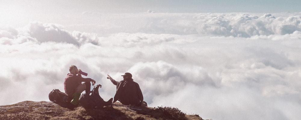Mountaineers observing a sea of clouds